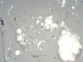 Paint Sphere Under the Microscope