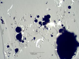 Paint Sphere Under the Microscope