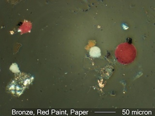 Paint Spheres and Other Debris Under the Microscope
